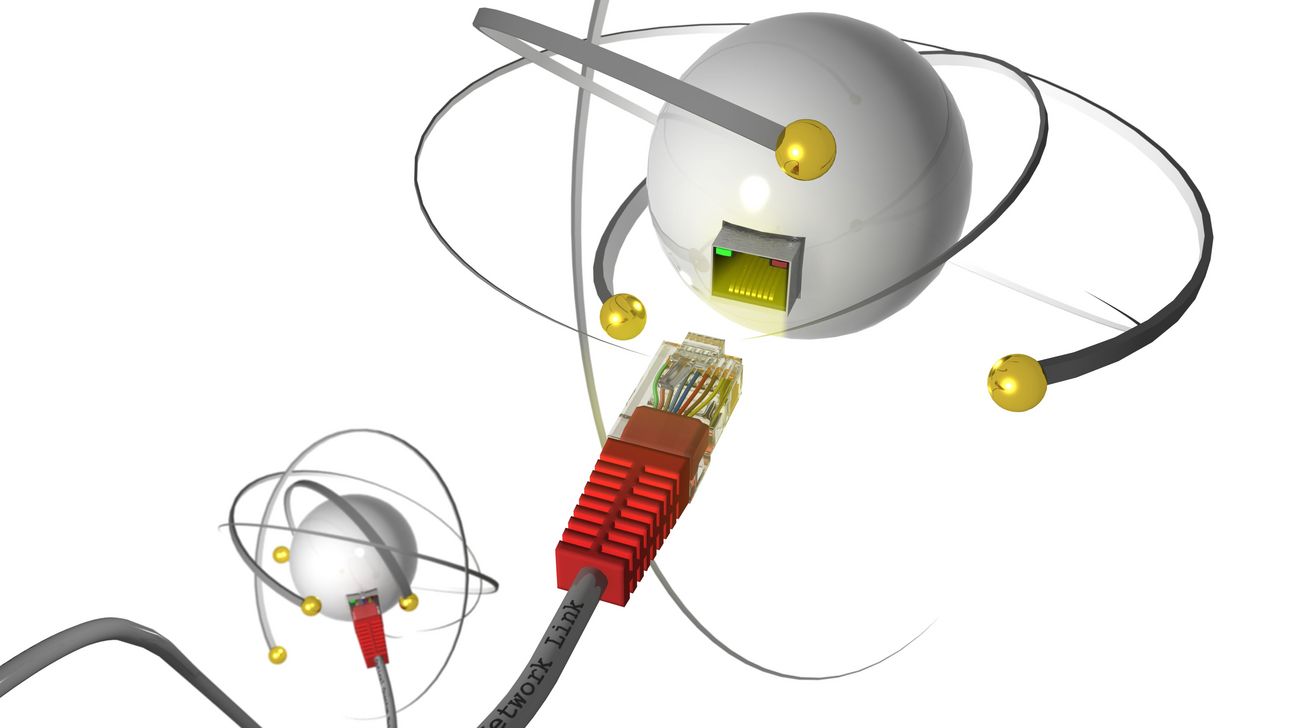 Graphic representation of a network plug. Around it fly stylized quanta.