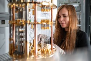 A researcher is looking at a quantum computer.