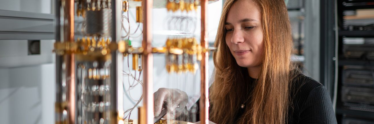 A researcher is looking at a quantum computer.