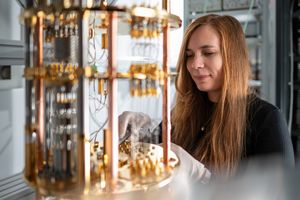 A researcher is looking at a quantum computer.
